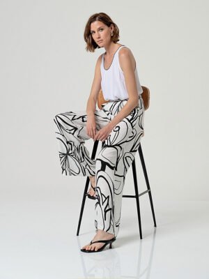 Fehér alapon fekete mintás bő szárú nadrág